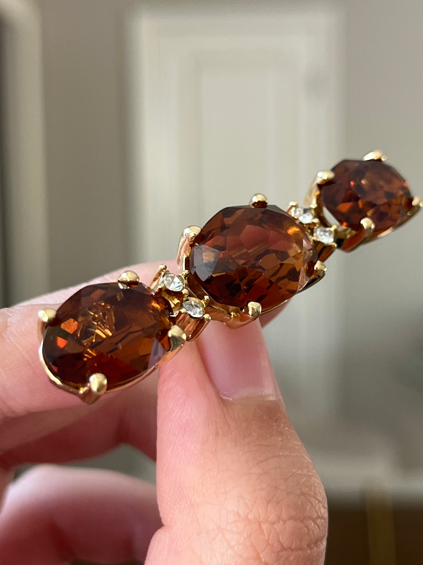 Vintage Christian Dior "Crystal" Collection Oval Open Back Brown Rhinestone Prong Gold-Tone Bar Brooch