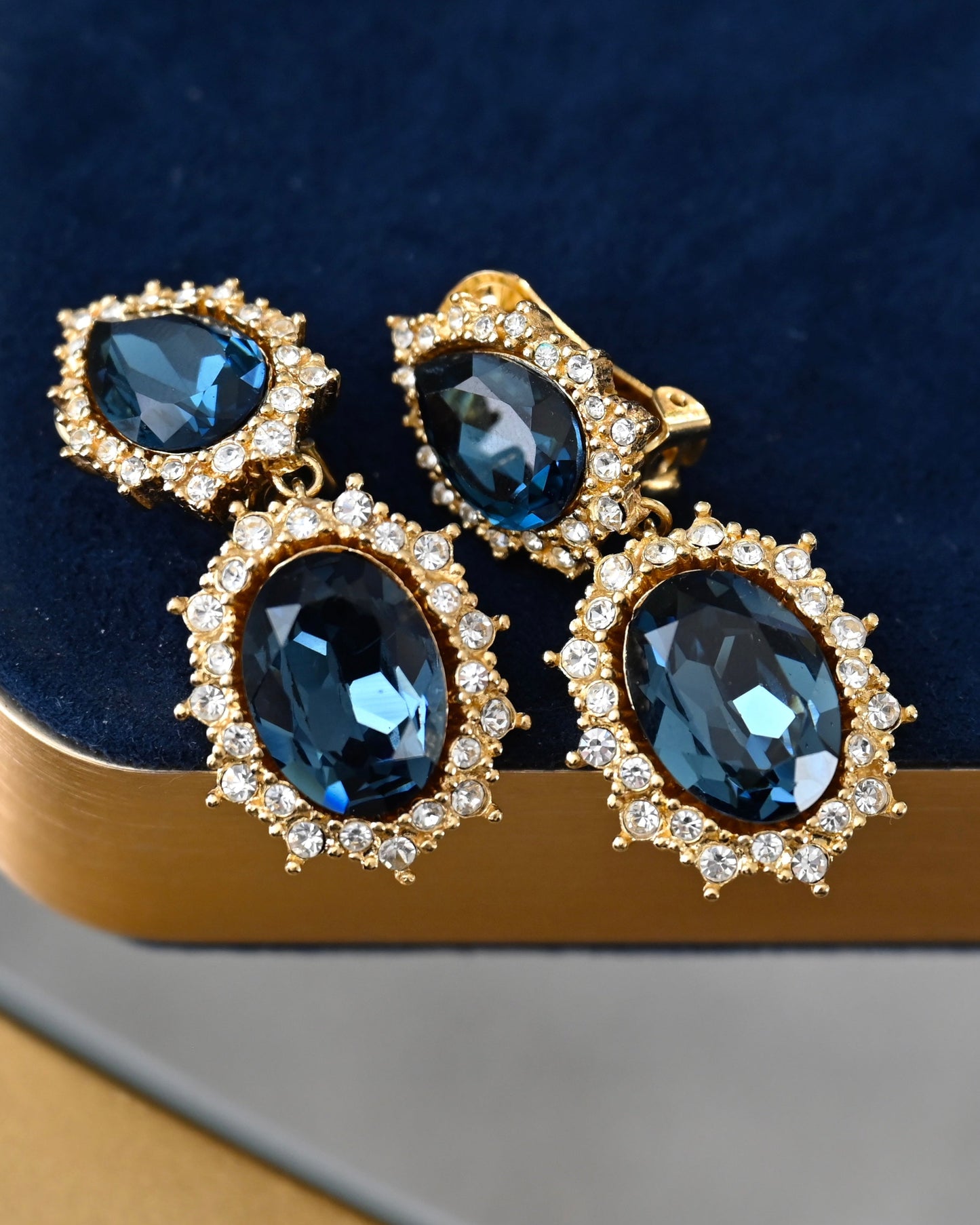 Vintage Christian Dior "Starburst" Collection Oval Blue Rhinestone Drop Dangle Gold-Tone Clip-On Earrings