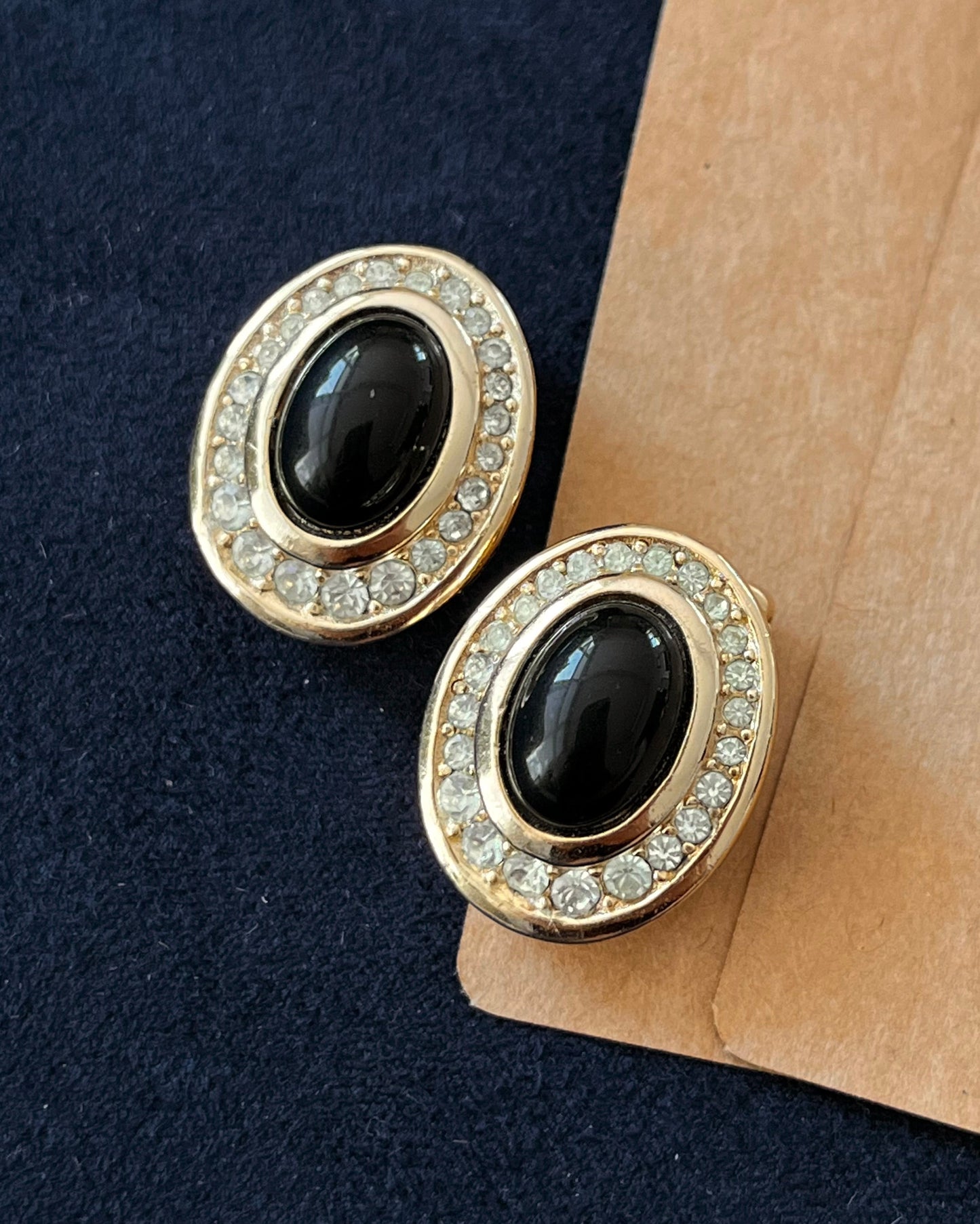 Vintage Christian Dior Oval Black Poured Glass Cabochon Rhinestone Edge Gold-Tone Clip-On Earrings