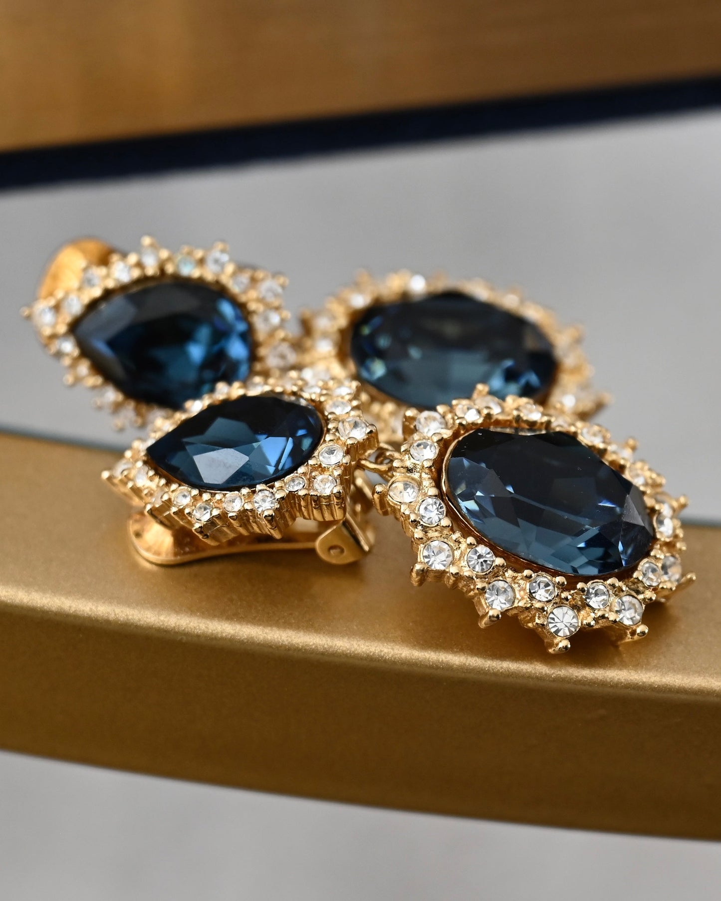Vintage Christian Dior "Starburst" Collection Oval Blue Rhinestone Drop Dangle Gold-Tone Clip-On Earrings