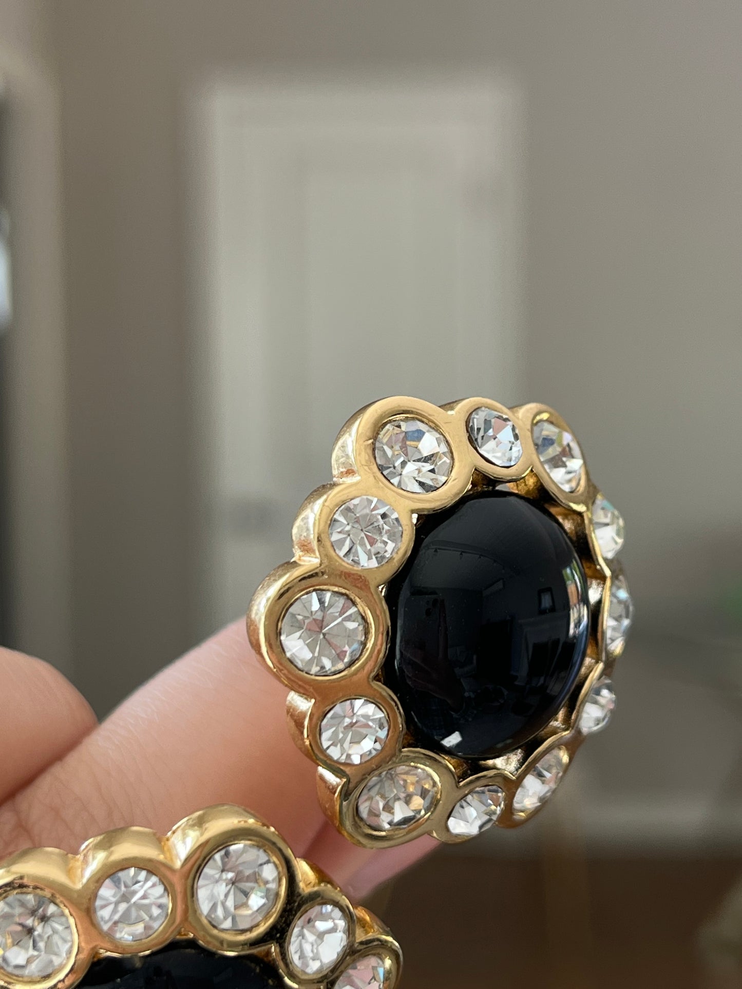 Vintage Christian Dior Flower Round Black Poured Glass Cabochon Large Rhinestone Edge Gold-Tone Clip-On Earrings