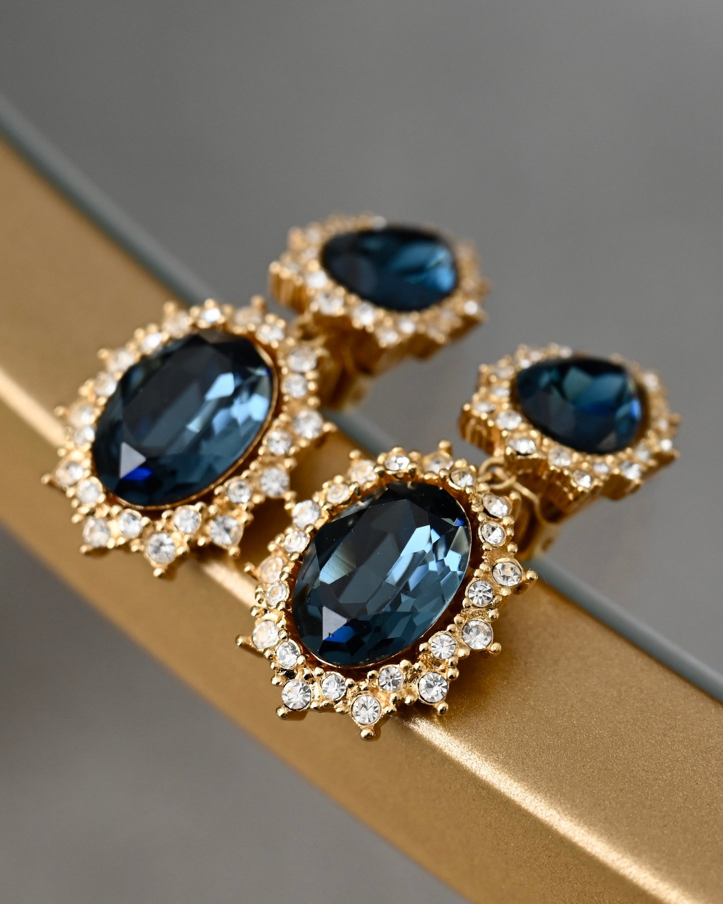 Vintage Christian Dior "Starburst" Collection Oval Blue Rhinestone Drop Dangle Gold-Tone Clip-On Earrings