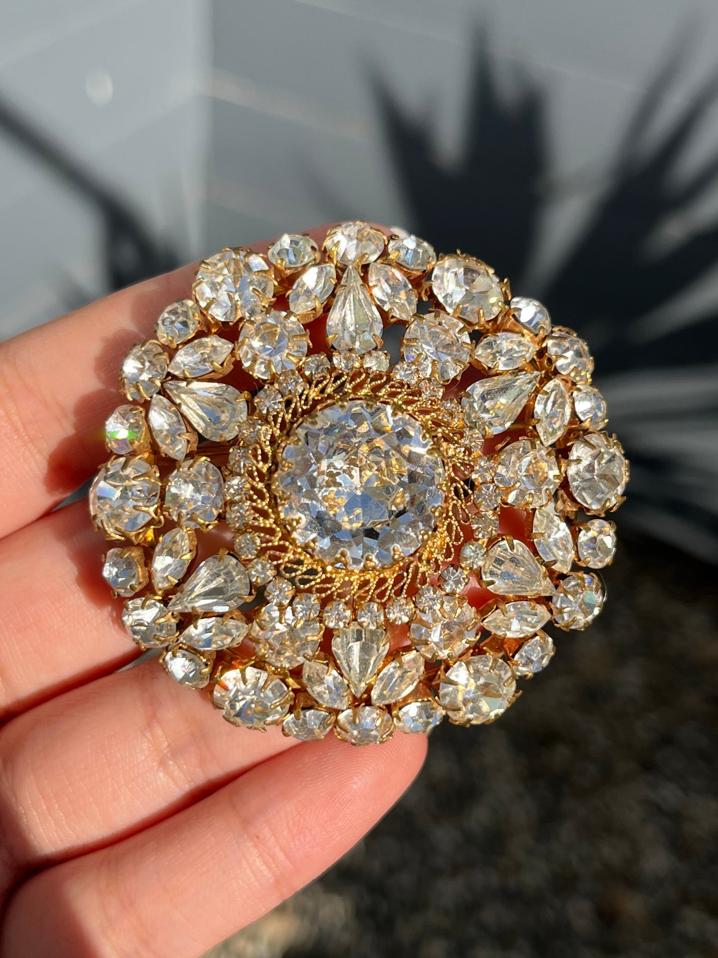 Vintage Made In Austria Snowflake Clear Rhinestone Prong Gold-Tone Filigree Brooch