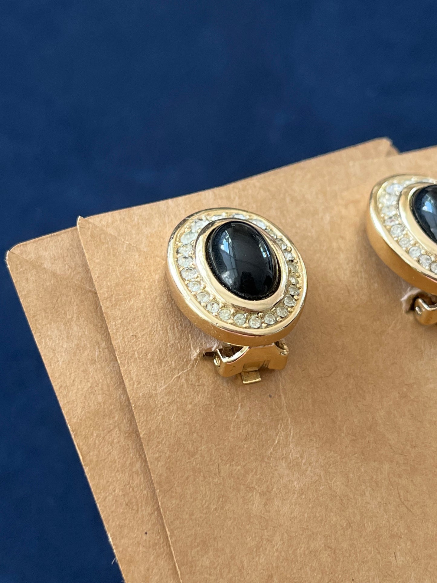 Vintage Christian Dior Oval Black Poured Glass Cabochon Rhinestone Edge Gold-Tone Clip-On Earrings
