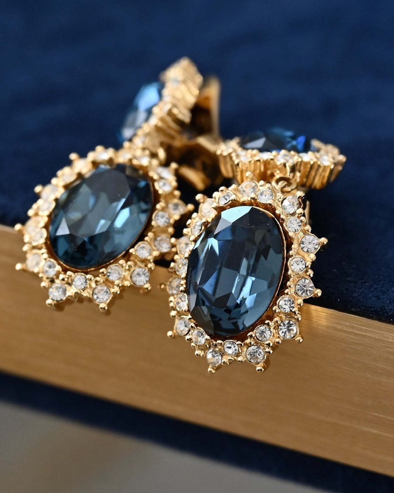 Vintage Christian Dior "Starburst" Collection Oval Blue Rhinestone Drop Dangle Gold-Tone Clip-On Earrings