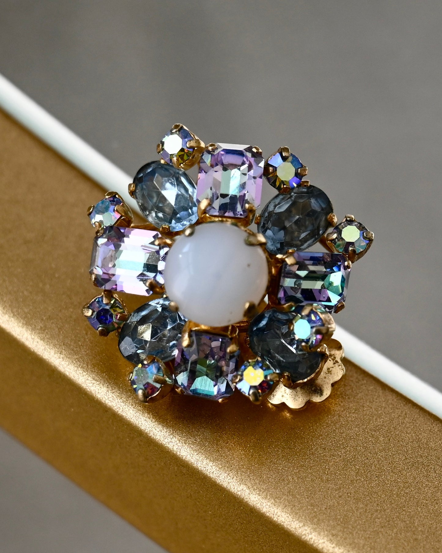 Vintage Christian Dior 1958 Blue Purple AB Rhinestone Prong Gold-Tone Clip-On Single Earring