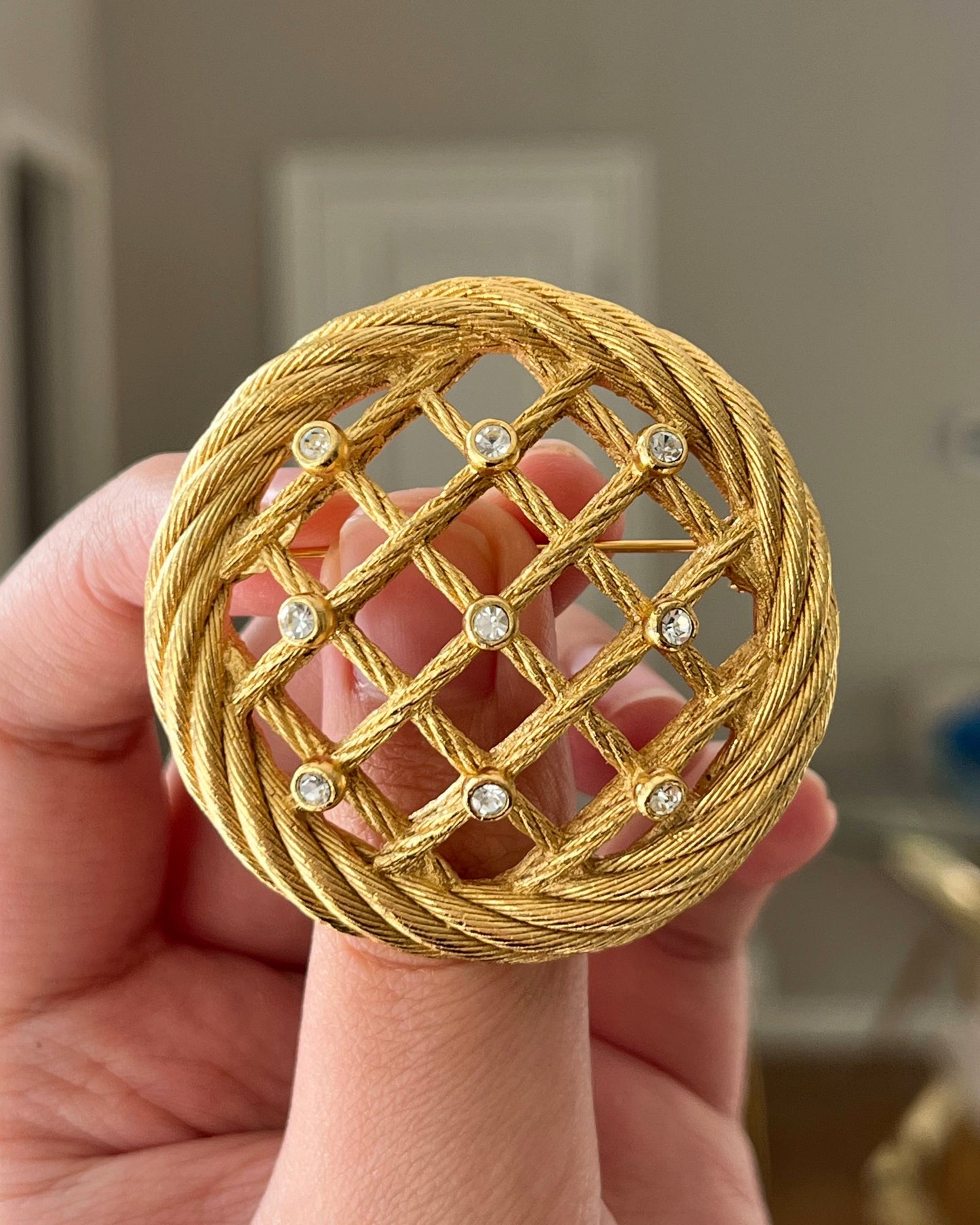 Vintage Christian Dior "Rope" Collection Dream Catcher Braided Knot Rhinestone Round Gold-Tone Brooch