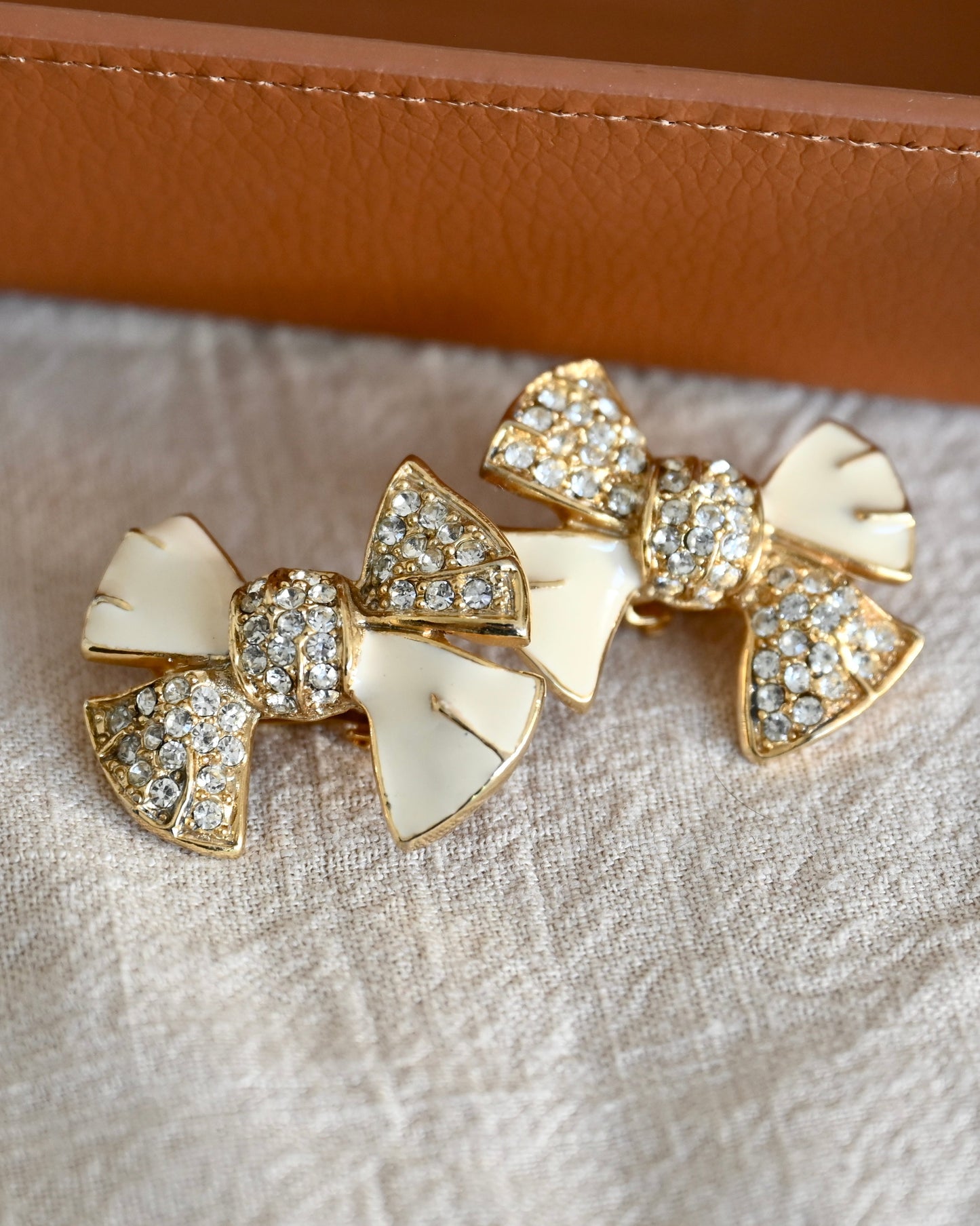 Vintage Givenchy Bow Tie Butterfly Knot White Enamel Rhinestone Pavé Gold-Tone Clip-on Earrings